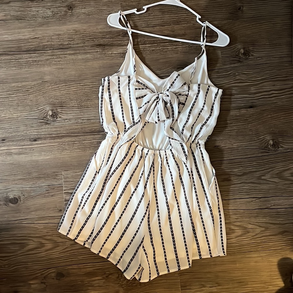 White stripped romper. Size medium.